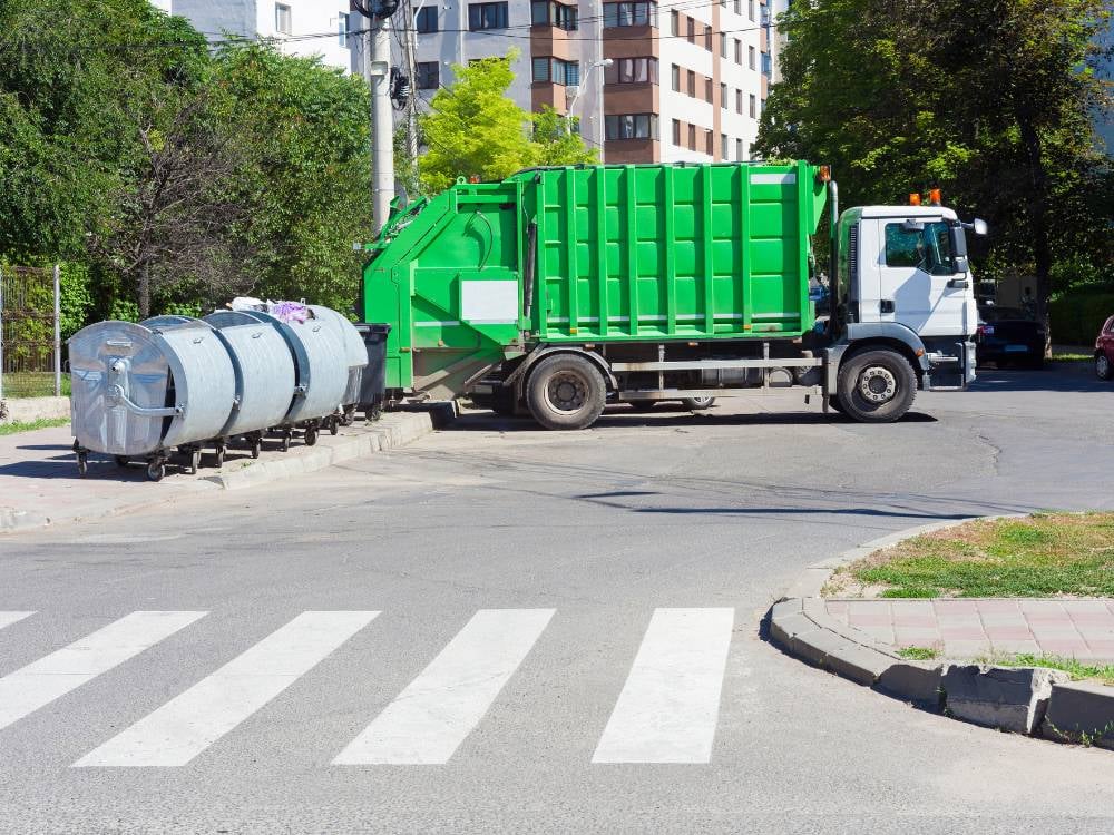 Waste compactor undergoing safety inspection